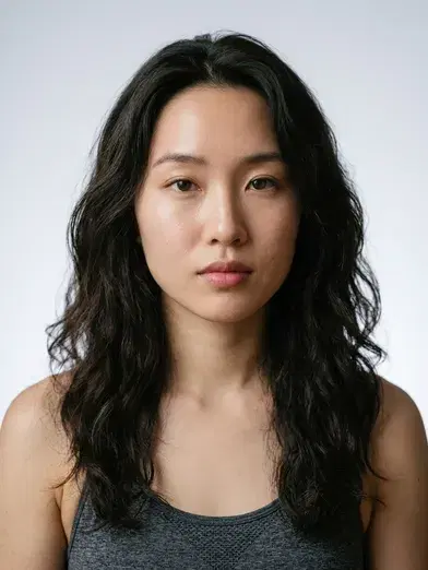 Yoga instructor headshot with clean studio backdrop